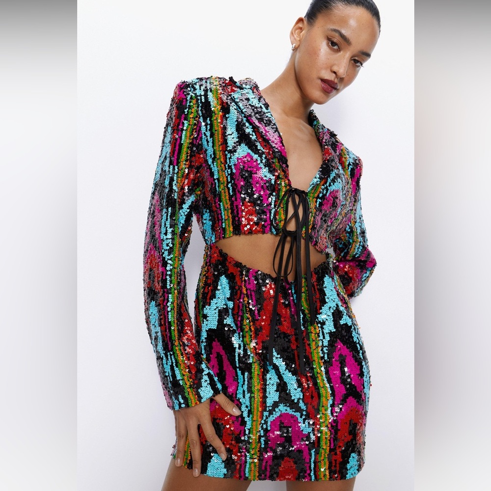 NWOT Multi Sequin Cut Out Detail Romper